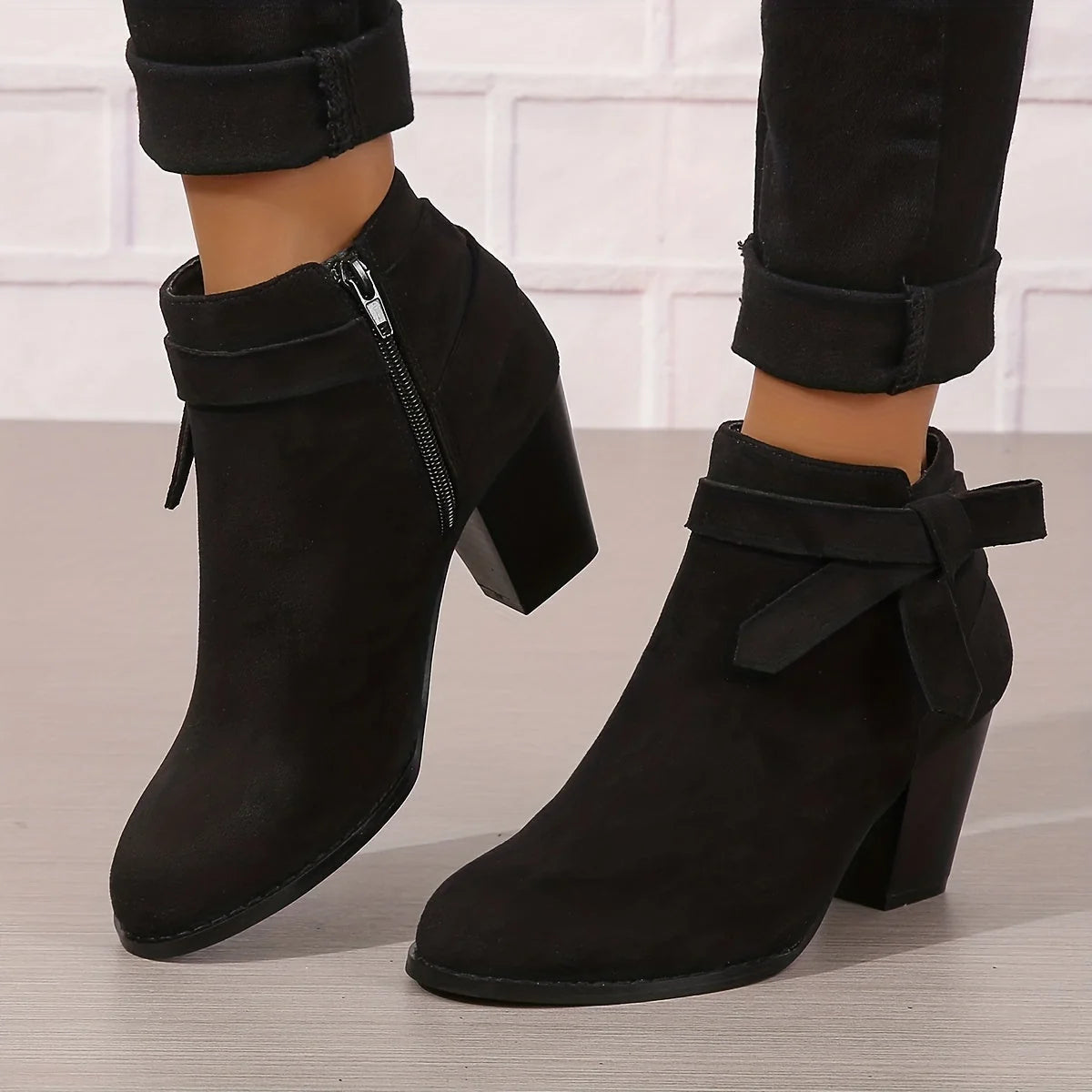 Botines de mujer de ante sintético con lazo trasero