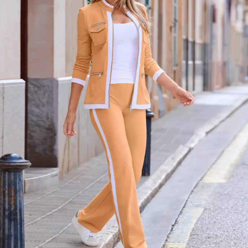 Conjunto deportivo para mujer con chaqueta entallada y cremalleras