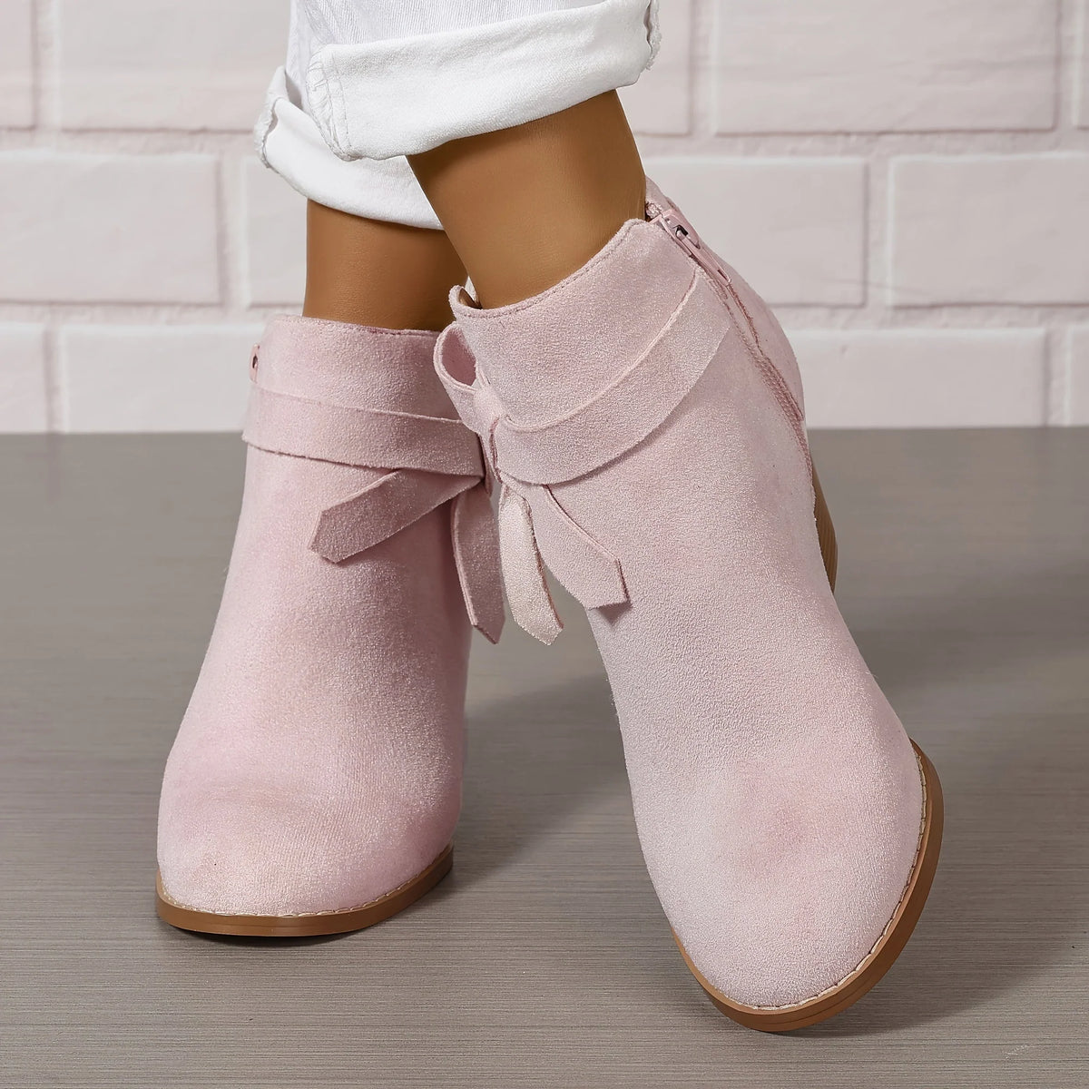 Botines de mujer de ante sintético con lazo trasero