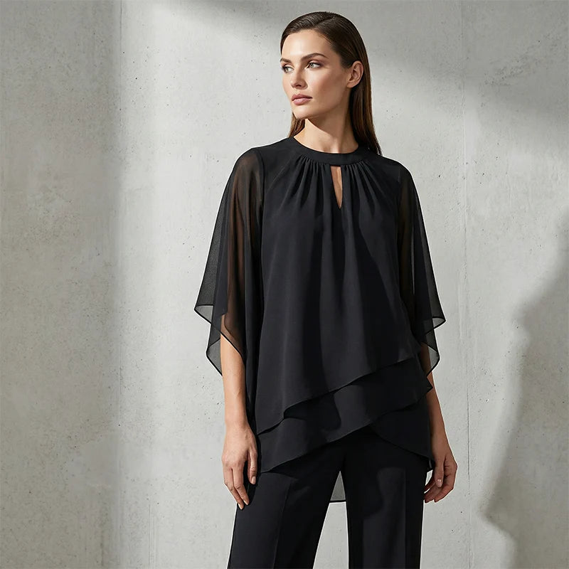 Conjunto de mujer con blusa asimétrica y pantalón de pierna ancha