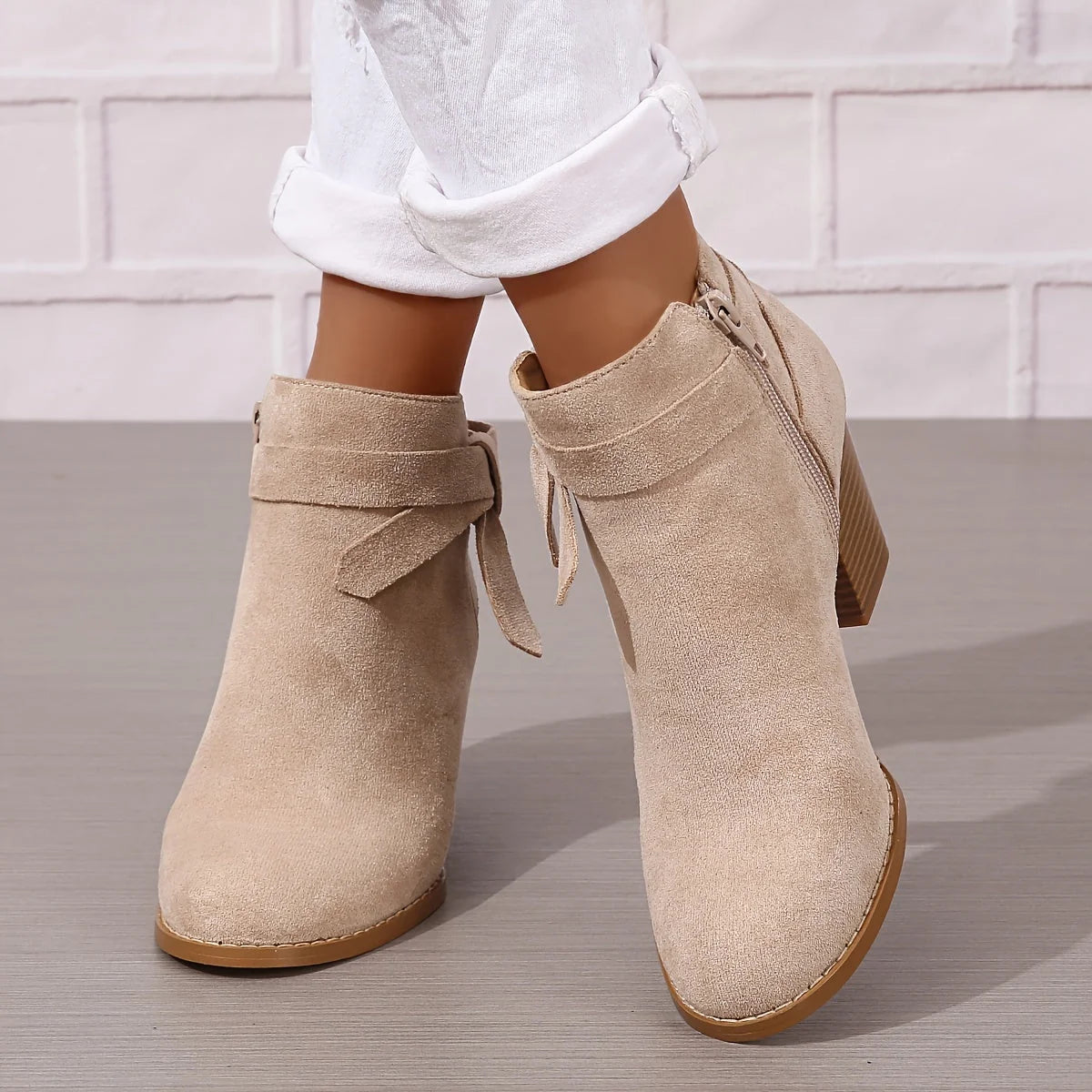 Botines de mujer de ante sintético con lazo trasero