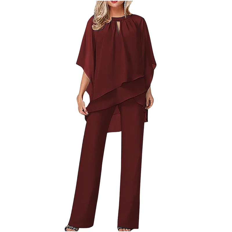 Conjunto de mujer con blusa asimétrica y pantalón de pierna ancha