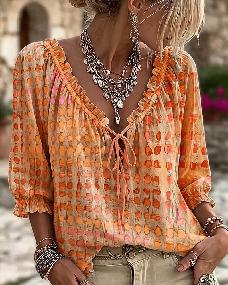 Blusa de mujer con volantes y lazo en el escote