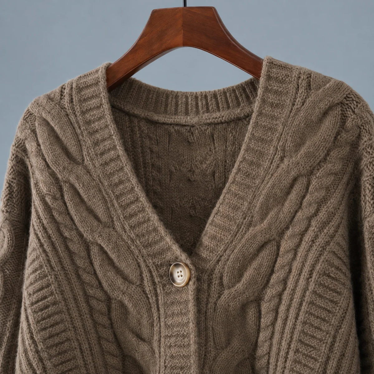Chaqueta de punto trenzado para mujer con mangas abullonadas