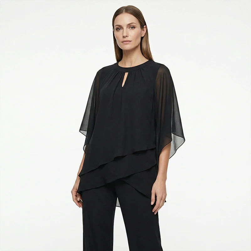 Conjunto de mujer con blusa asimétrica y pantalón de pierna ancha