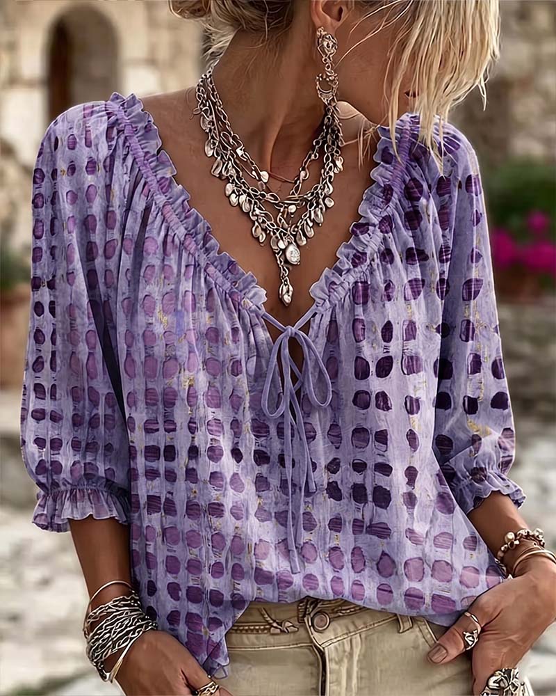 Blusa de mujer con volantes y lazo en el escote