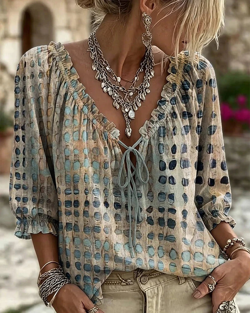 Blusa de mujer con volantes y lazo en el escote