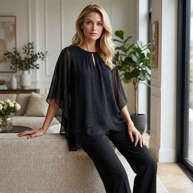 Conjunto de mujer con blusa asimétrica y pantalón de pierna ancha