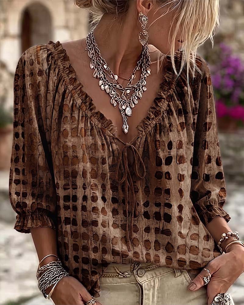 Blusa de mujer con volantes y lazo en el escote