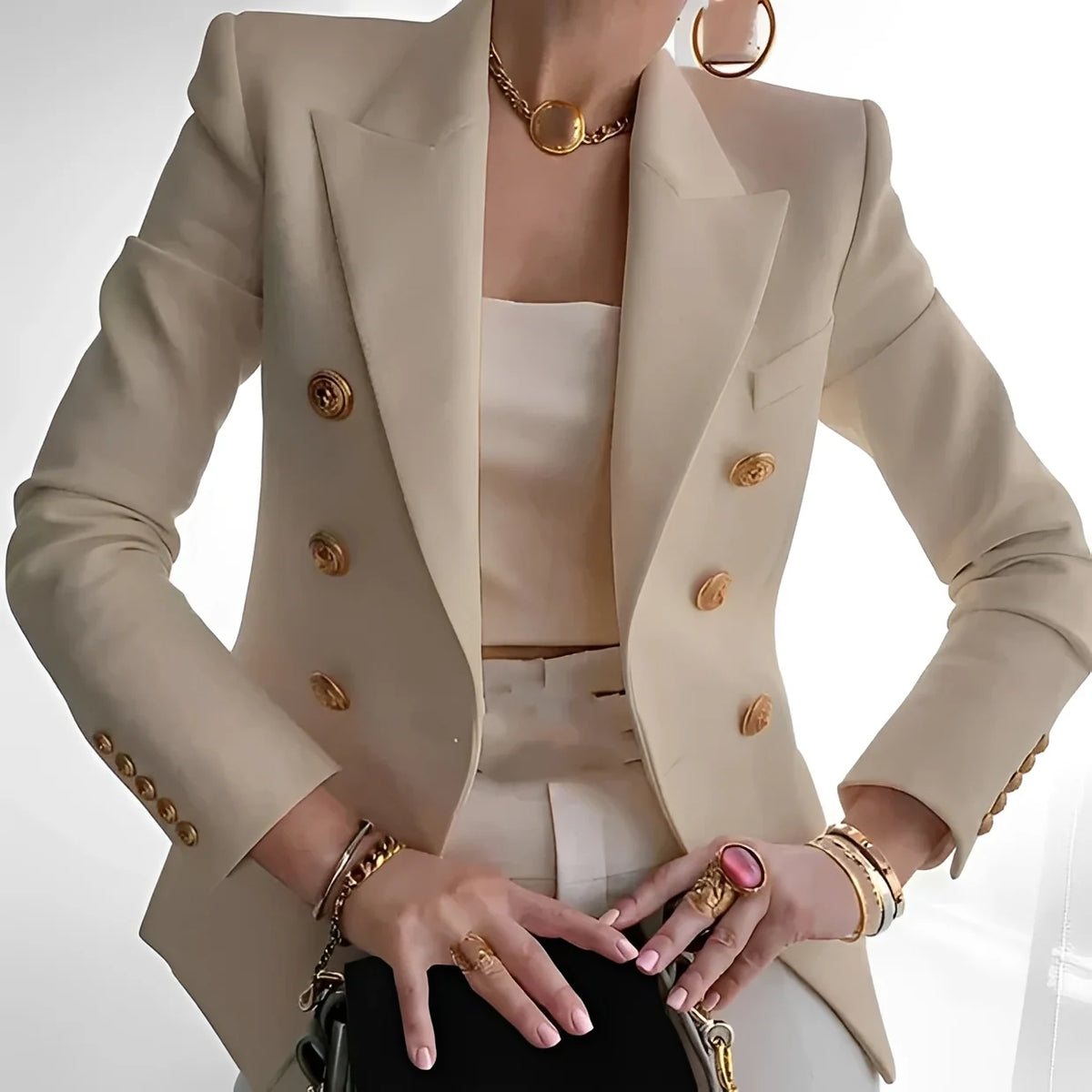 Blazer de mujer con doble botonadura y botones dorados