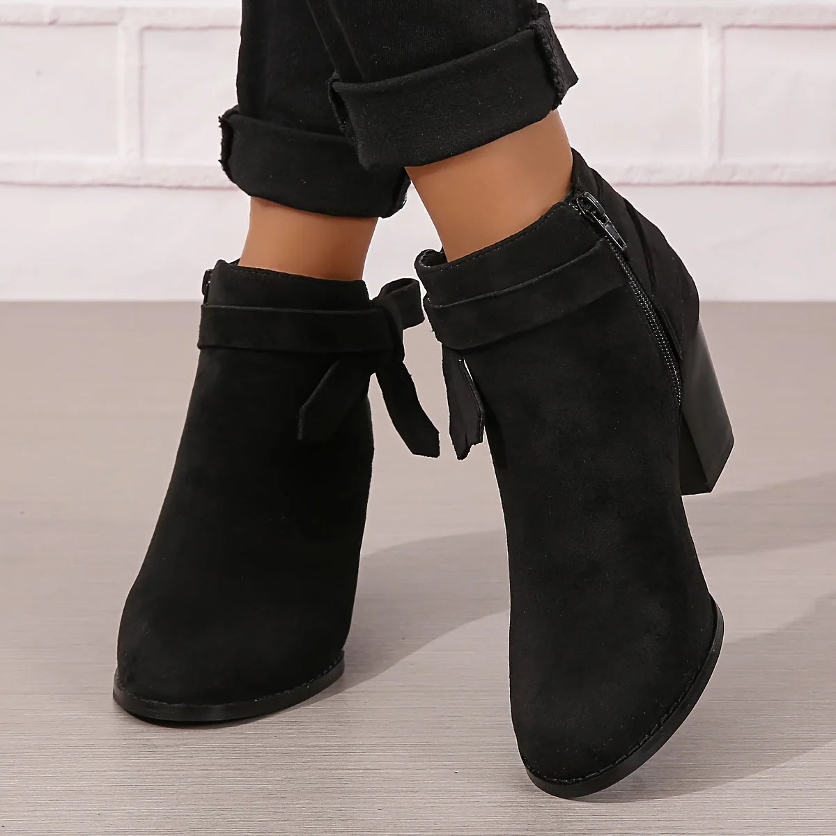 Botines de mujer de ante sintético con lazo trasero