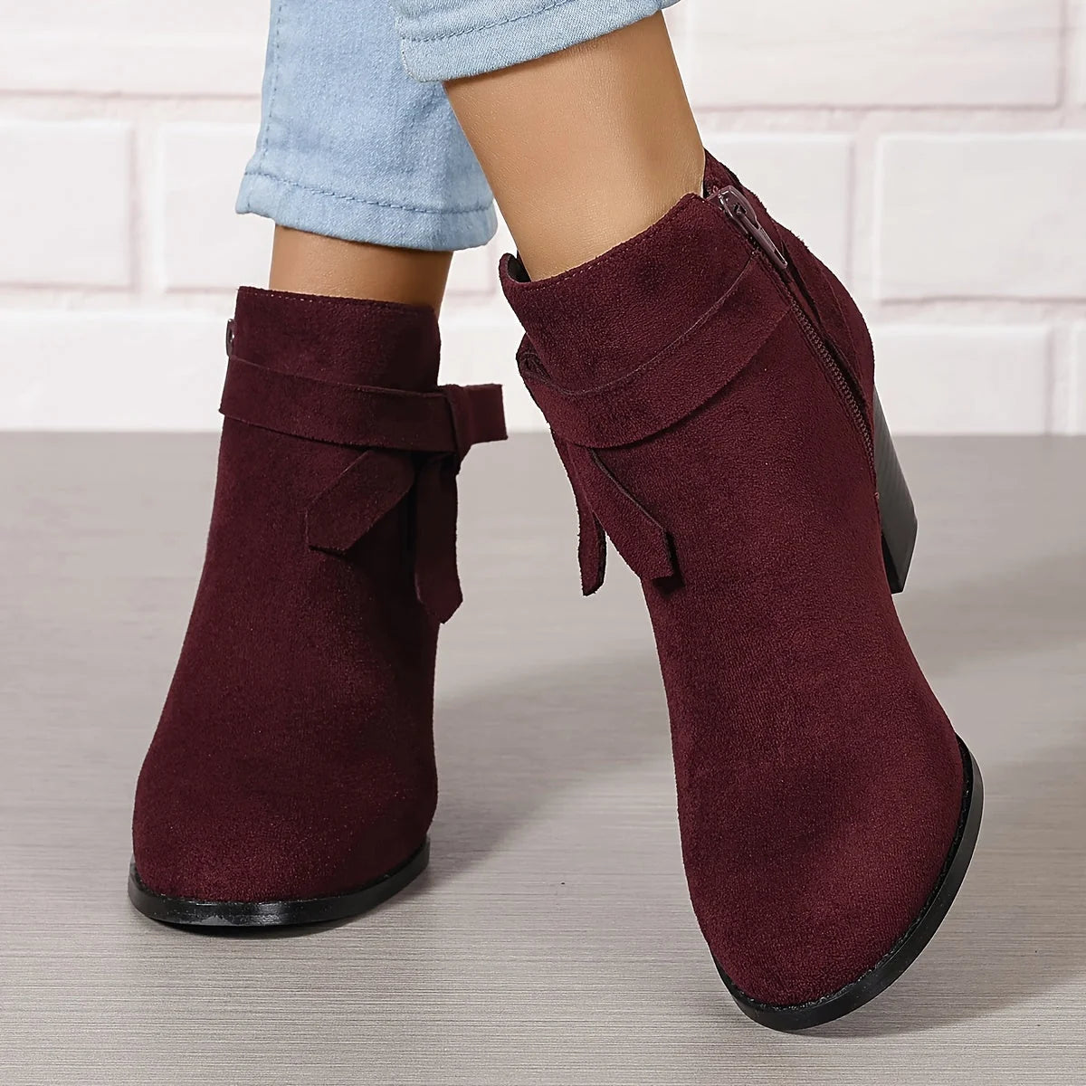 Botines de mujer de ante sintético con lazo trasero